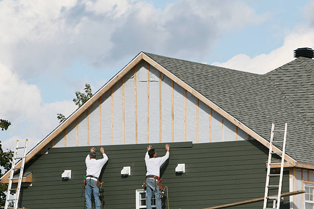 Professional Siding Replacement technician working in Franktown, CO